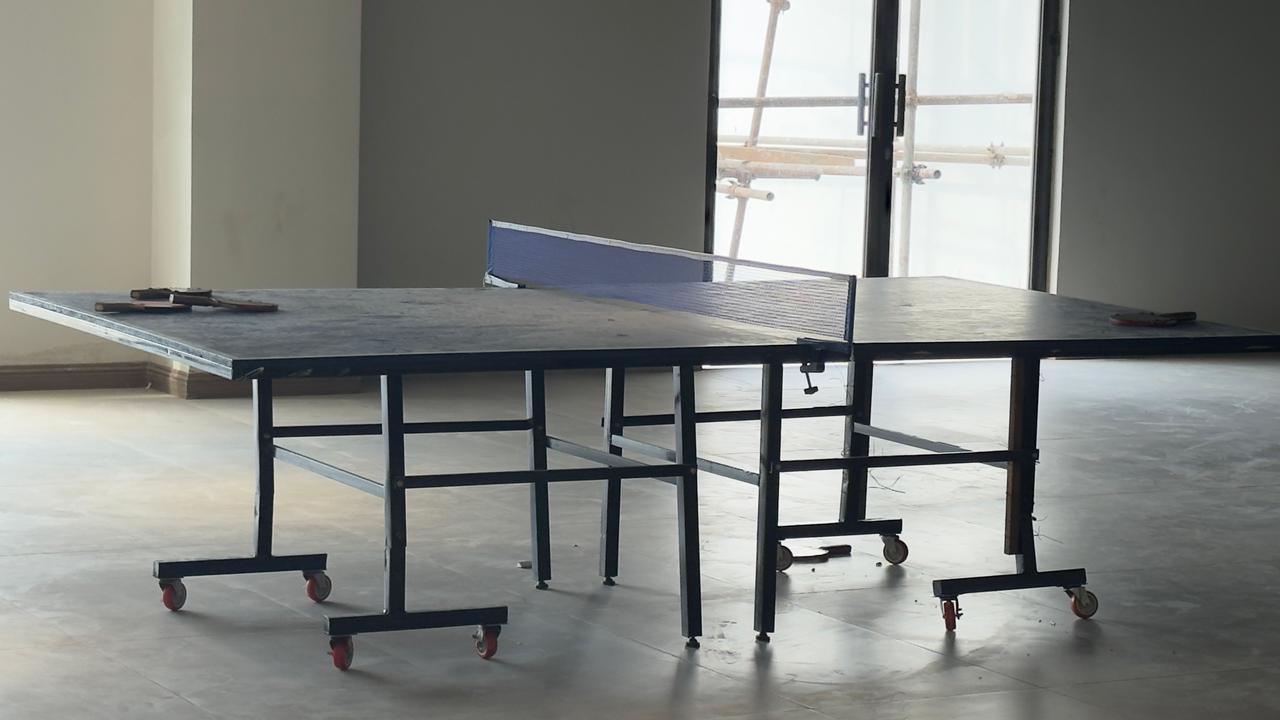 Indoor table tennis setup inside Silicon Village Smart City Capital recreational area with modern workspace environment
